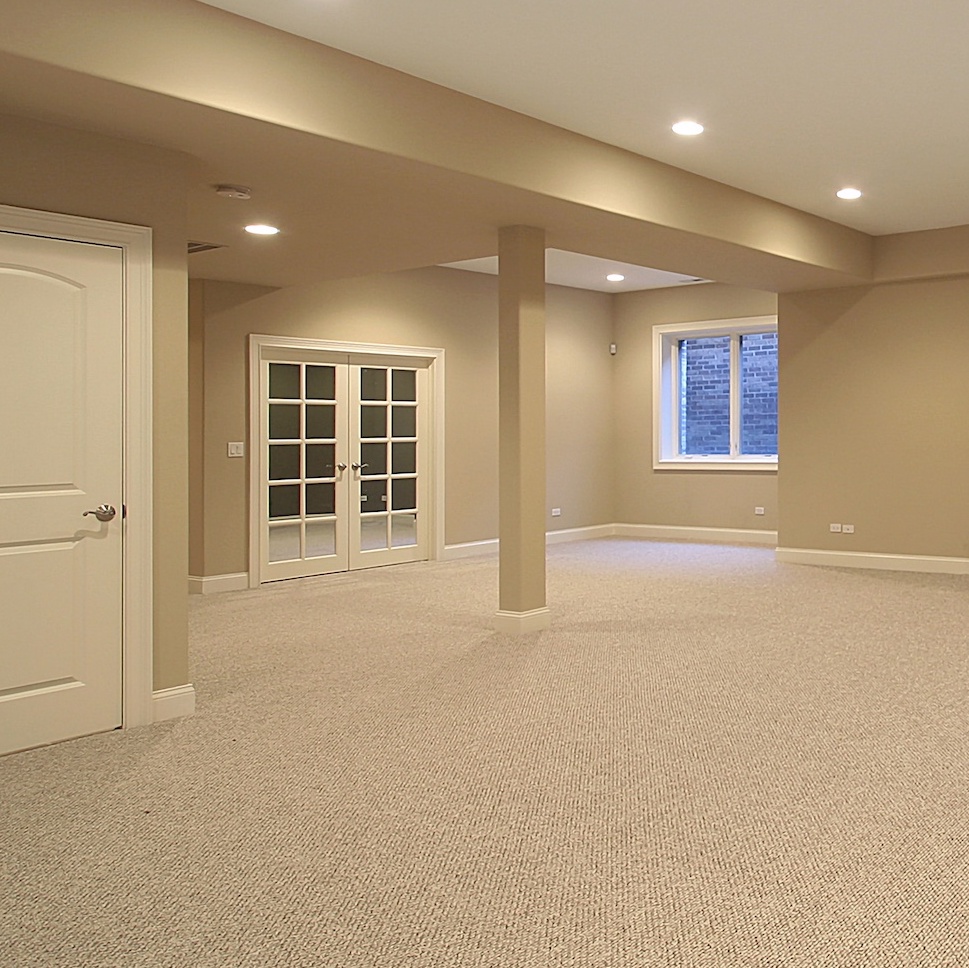 Basement in new construction home with fireplace
